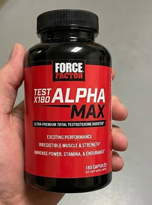 holding alpha max bottle