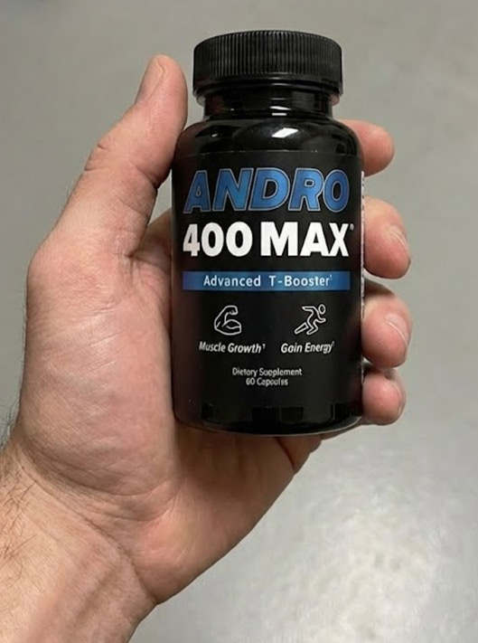 holding andro max bottle